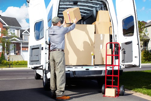Local removals crew loading items for a move around Keston