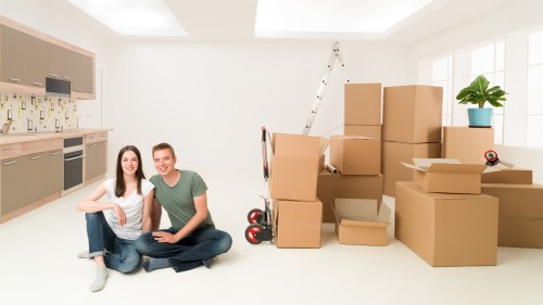 Moving team loading furniture for a home move in Keston