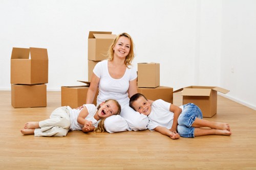 Packed office boxes and furniture ready for relocation