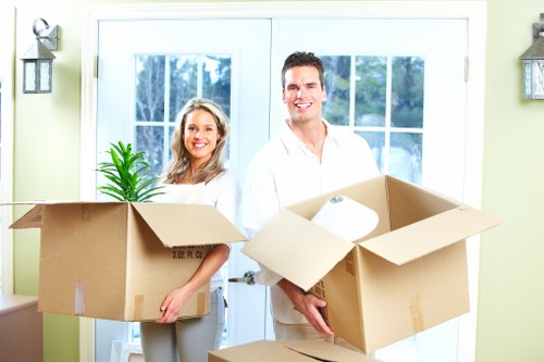 Packed boxes and furniture ready for transport during a removal service