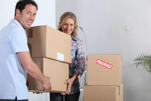 Careful unpacking of household items in a Keston property