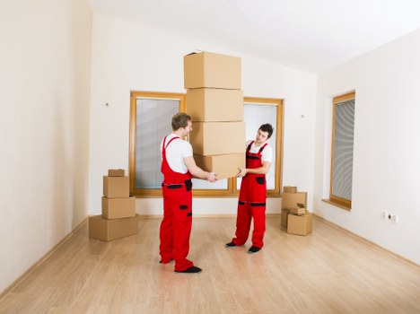 Household items being loaded into a moving van in Keston